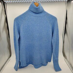 J Crew XXS light blue women's turtleneck sweater with side vents.